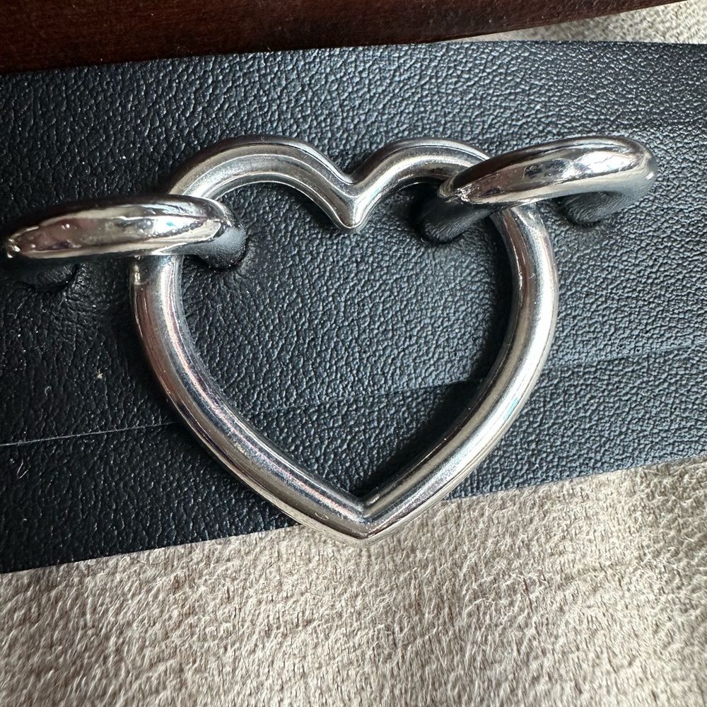 Faux leather cuff with heart detail
